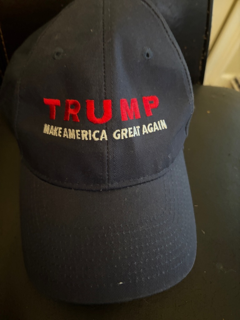 Embroidered Navy Ball Cap with Red White Text MAGA with flag logo